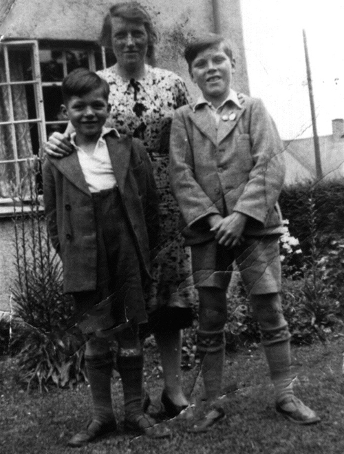 Foster mother Mrs Tibbitts with George Lane and James Simpson from West Ham. (1939)